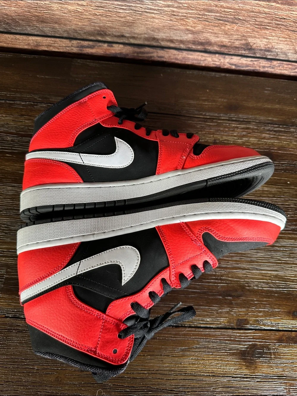 Nike Air Jordan 1 Mid Infrared 23 sneakers in Black and Neon Red